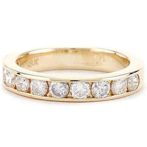 diamond channel band yellow gold